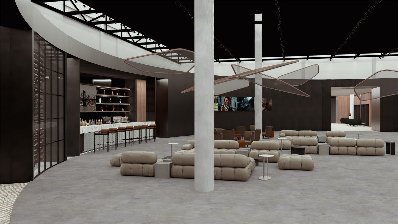 The bar along one side of the hall with lounge seating opposite