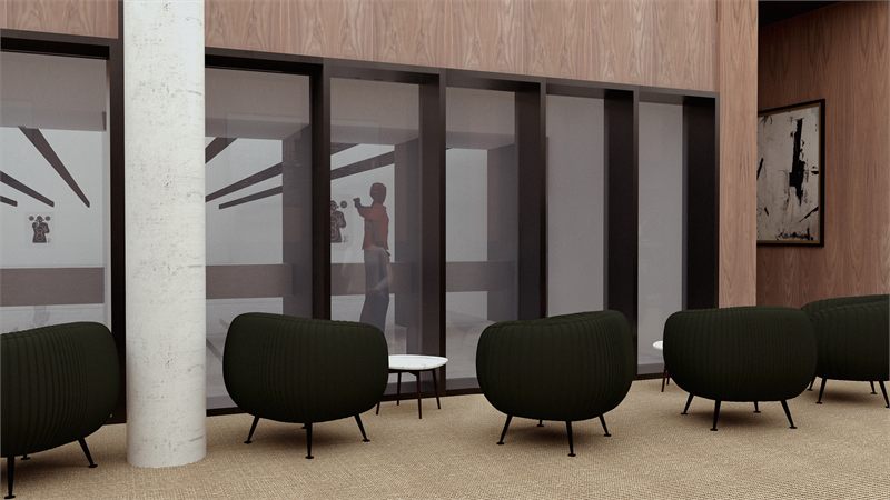 Shooting range corridor with green upholstered chairs facing the glazed bays