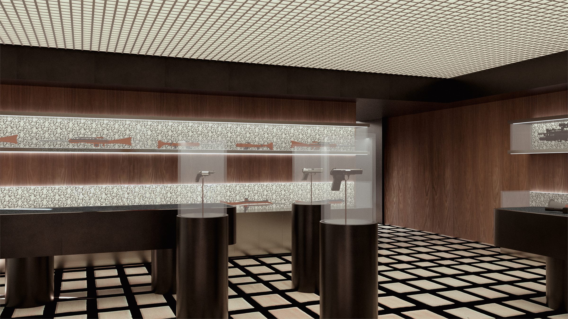 Freestanding glass vitrines and a lit display shelf running the length of the retail wall