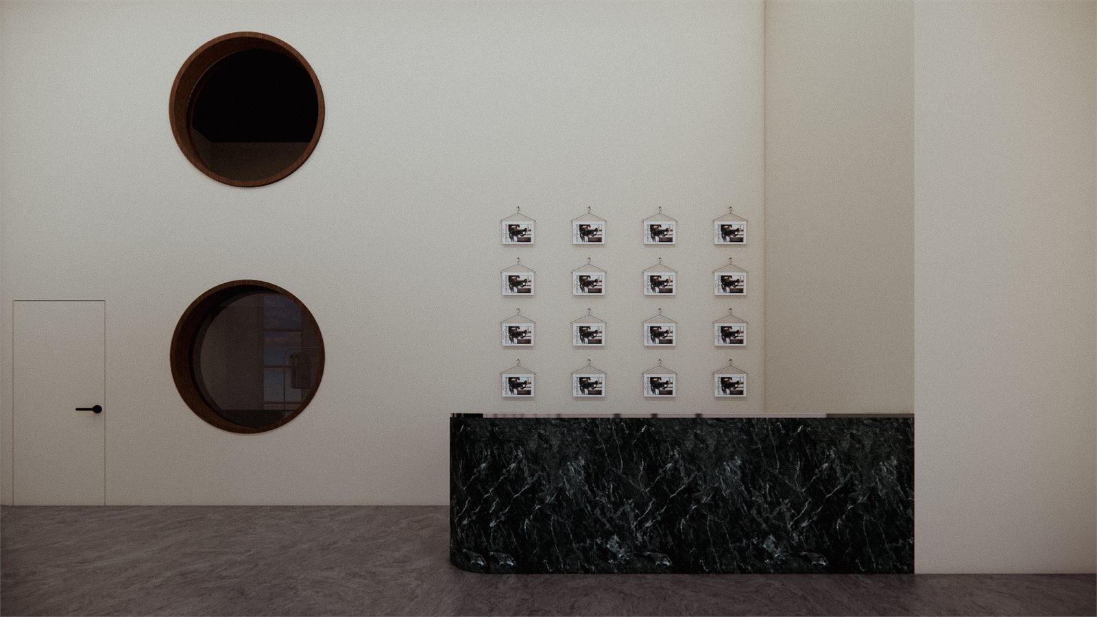 Dark stone reception counter below two round openings and a grid of framed swatches