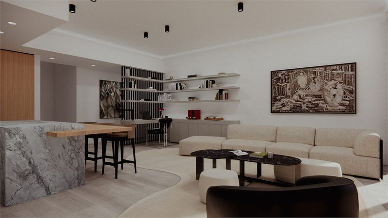 The same room from the kitchen, shelving and a long sofa beyond the island