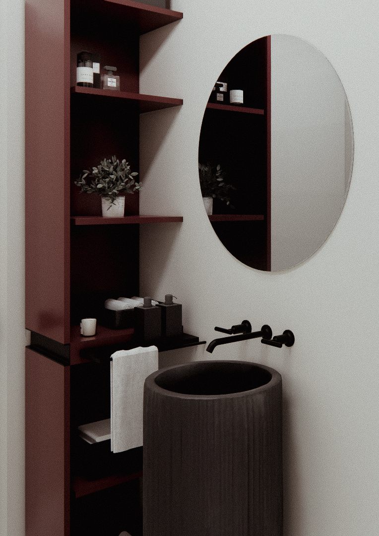 Oval mirror and open shelving beside a dark stone basin