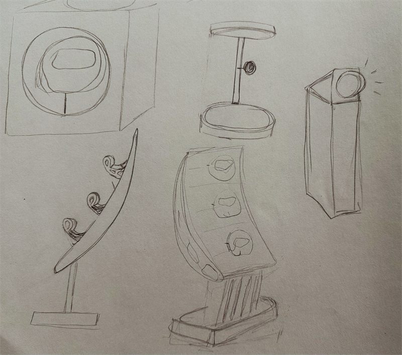 Pencil studies of table lamps and a floor lamp on a curved stem