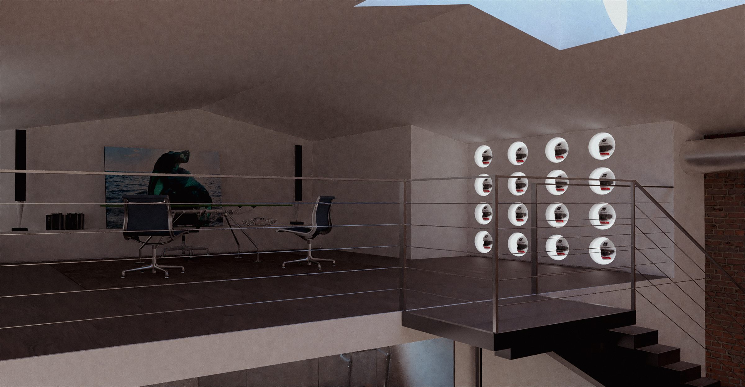 Desk and task chairs on the mezzanine below the wheel display